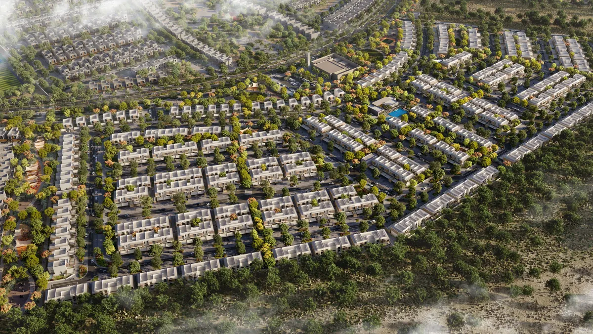 Aerial view of the Al Ghadeer Parks masterplan, rows of townhouses between green parks
